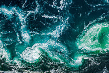 Image showing Waves of water of the river and the sea meet each other during h