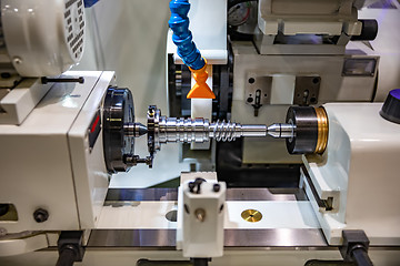 Image showing Metalworking CNC lathe milling machine. Cutting metal modern pro