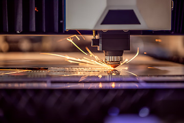 Image showing CNC Laser cutting of metal, modern industrial technology.