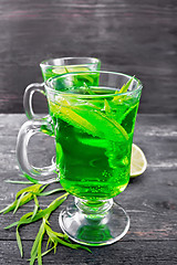 Image showing Lemonade Tarragon in two goblets on black board