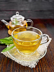 Image showing Tea herbal with sage in glass cup on napkin