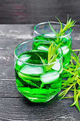 Image showing Lemonade Tarragon in two glasses on black wooden board