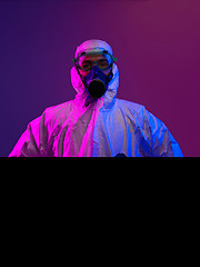 Image showing Doctor wearing protective biological suit and mask due to corona