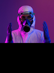 Image showing Doctor wearing protective biological suit and mask due to corona