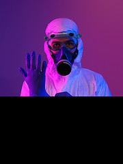 Image showing Doctor wearing protective biological suit and mask due to corona