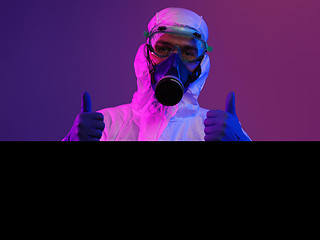 Image showing Doctor wearing protective biological suit and mask due to corona