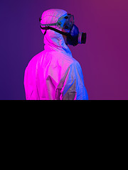 Image showing Doctor wearing protective biological suit and mask due to corona