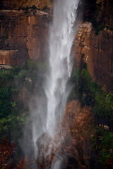 Image showing Powerful waterfall tumbling over sandstone cliffs 