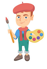 Image showing Boy dressed as an artist holding brush and paints.