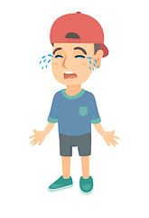 Image showing Sad caucasian boy in a cap sobbing.