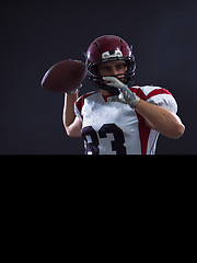 Image showing american football player throwing ball