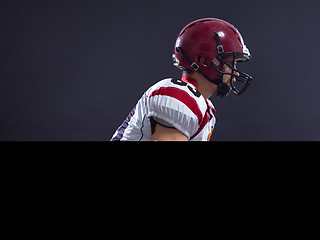 Image showing American football Player running with the ball