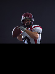 Image showing american football player throwing ball