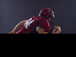 Image showing American football Player running with the ball