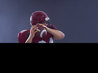 Image showing american football player throwing ball