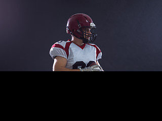 Image showing american football player throwing ball