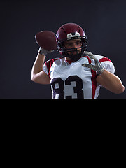 Image showing american football player throwing ball