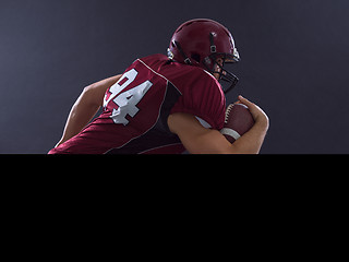 Image showing American football Player running with the ball