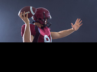 Image showing american football player throwing ball