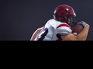 Image showing American football Player running with the ball