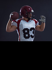 Image showing american football player throwing ball