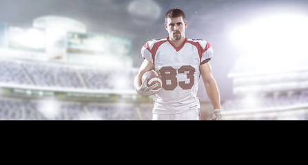 Image showing American Football Player isolated on big modern stadium field