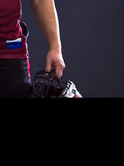 Image showing closeup American Football Player isolated on gray