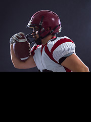 Image showing American football Player running with the ball