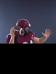 Image showing american football player throwing ball