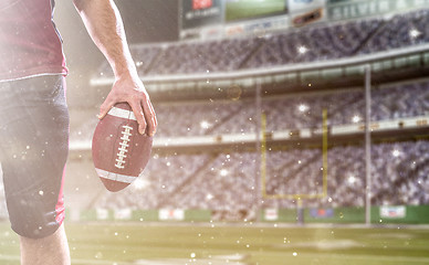 Image showing closeup American Football Player isolated on big modern stadium