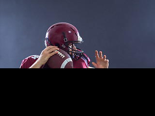 Image showing american football player throwing ball