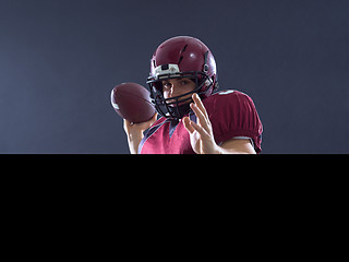 Image showing american football player throwing ball