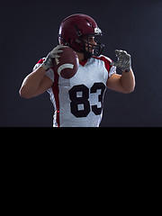 Image showing american football player throwing ball