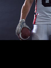 Image showing closeup American Football Player isolated on gray