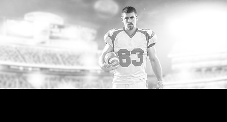 Image showing American Football Player isolated on big modern stadium field