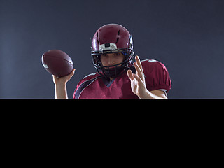 Image showing american football player throwing ball