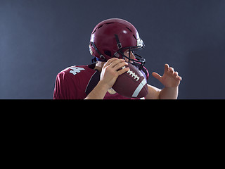 Image showing american football player throwing ball