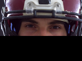 Image showing closeup American Football Player isolated on gray