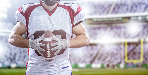 Image showing closeup American Football Player isolated on big modern stadium