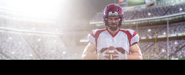 Image showing American Football Player isolated on big modern stadium field