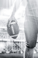 Image showing closeup American Football Player isolated on big modern stadium