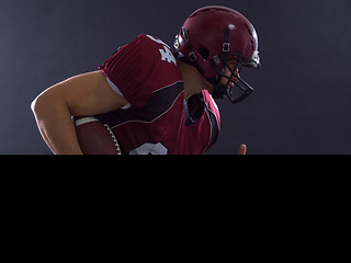 Image showing American football Player running with the ball