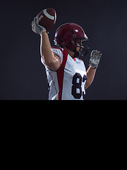 Image showing american football player throwing ball