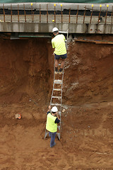 Image showing Construction Worker on a ladder