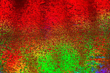 Image showing Texture of red foil with holographic effect. Christmas background.