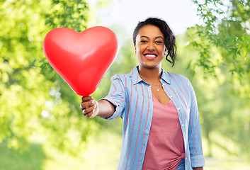 Image showing african american woman with heart-shaped balloon