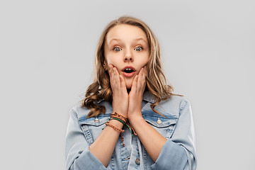 Image showing surprised or scared teenage girl in red t-shirt