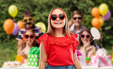 Image showing girl in heart shaped sunglasses at birthday party