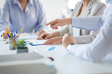 Image showing business team discussing charts at office