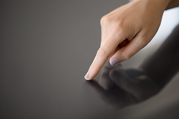 Image showing hand using black interactive panel